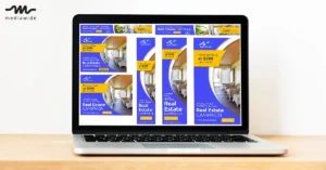 Laptop screen showing digital advertisements for a real estate campaign with blue and yellow designs, pricing starting at $299 per month, and images of a furnished porch for affordable housing options